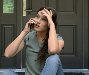Woman calling Lock & Key Bradford for help after finding herself locked out